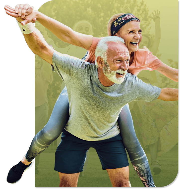 Playful Elderly Couple Enjoying an Outdoor Fitness Event in Independent Living